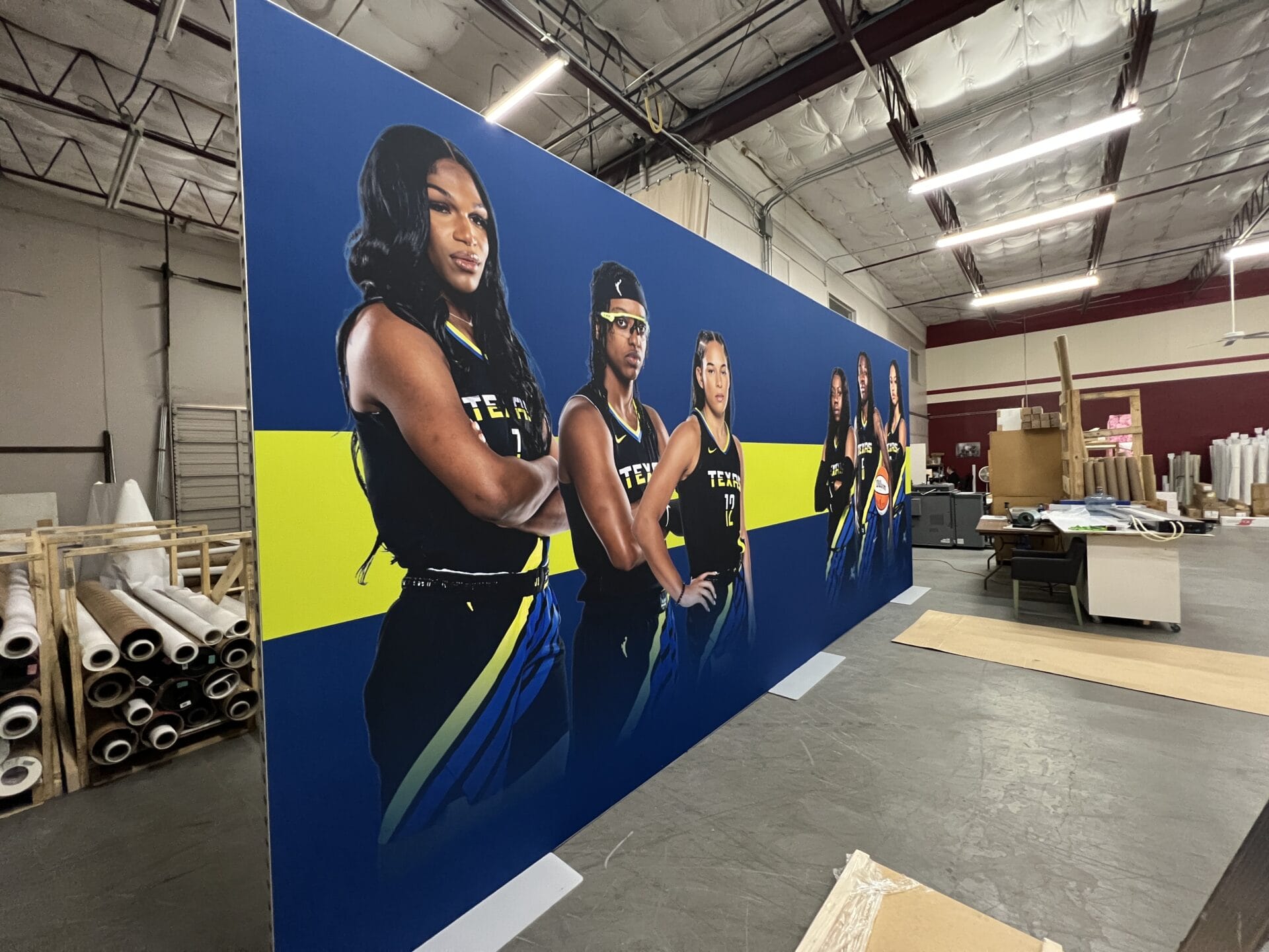 Elevating the Fan Experience: Positive Marketing USA’s Dye Sublimation Fabric Prints for the Dallas Wings’ VIP Section