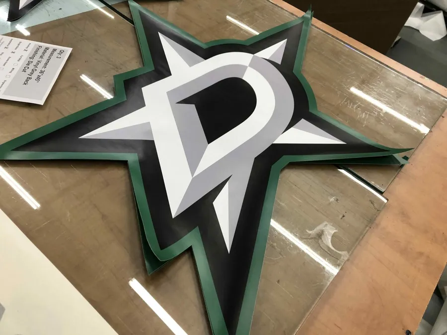 Die-cut vinyl decal of the Dallas Stars logo cut to shape in Dallas