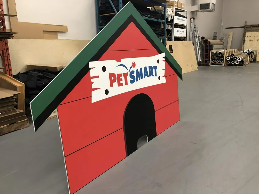 Flatbed printed coroplast PetSmart dog house cutout display in Dallas