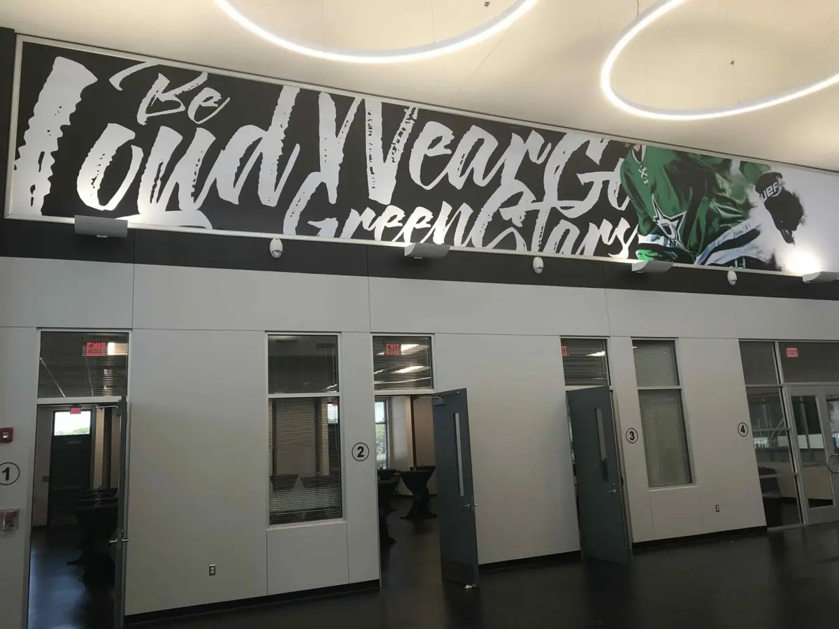 Be Loud Wear Green interior wall mural printed large format for the Dallas Stars