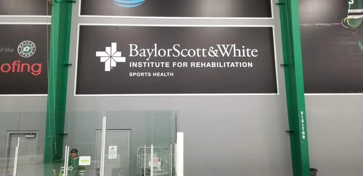 Baylor Scott and White large format wall signage at the Dallas Stars facility