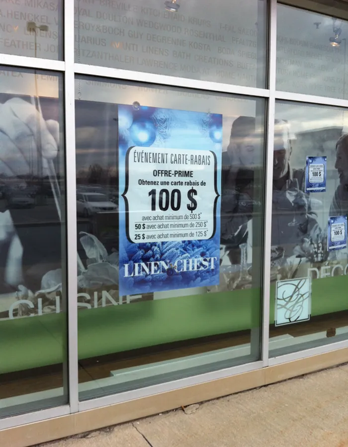 Large window poster print for Linen Chest storefront in Dallas